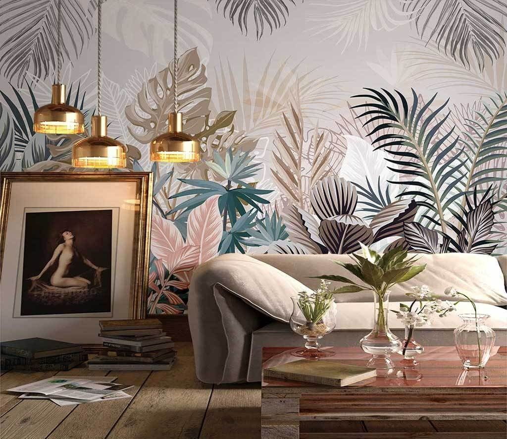 Feuilles tropicales pastel dans un intérieur