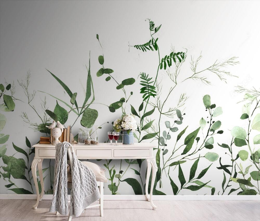Rameaux verts sur blanc dans un intérieur