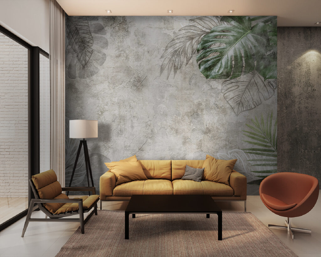 Feuilles sur mur ancien dans un intérieur