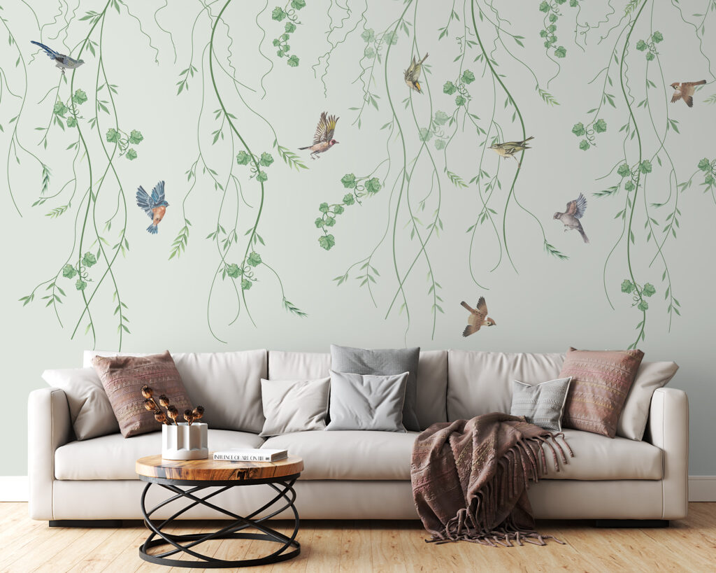 Petits oiseaux et rameaux dans un intérieur