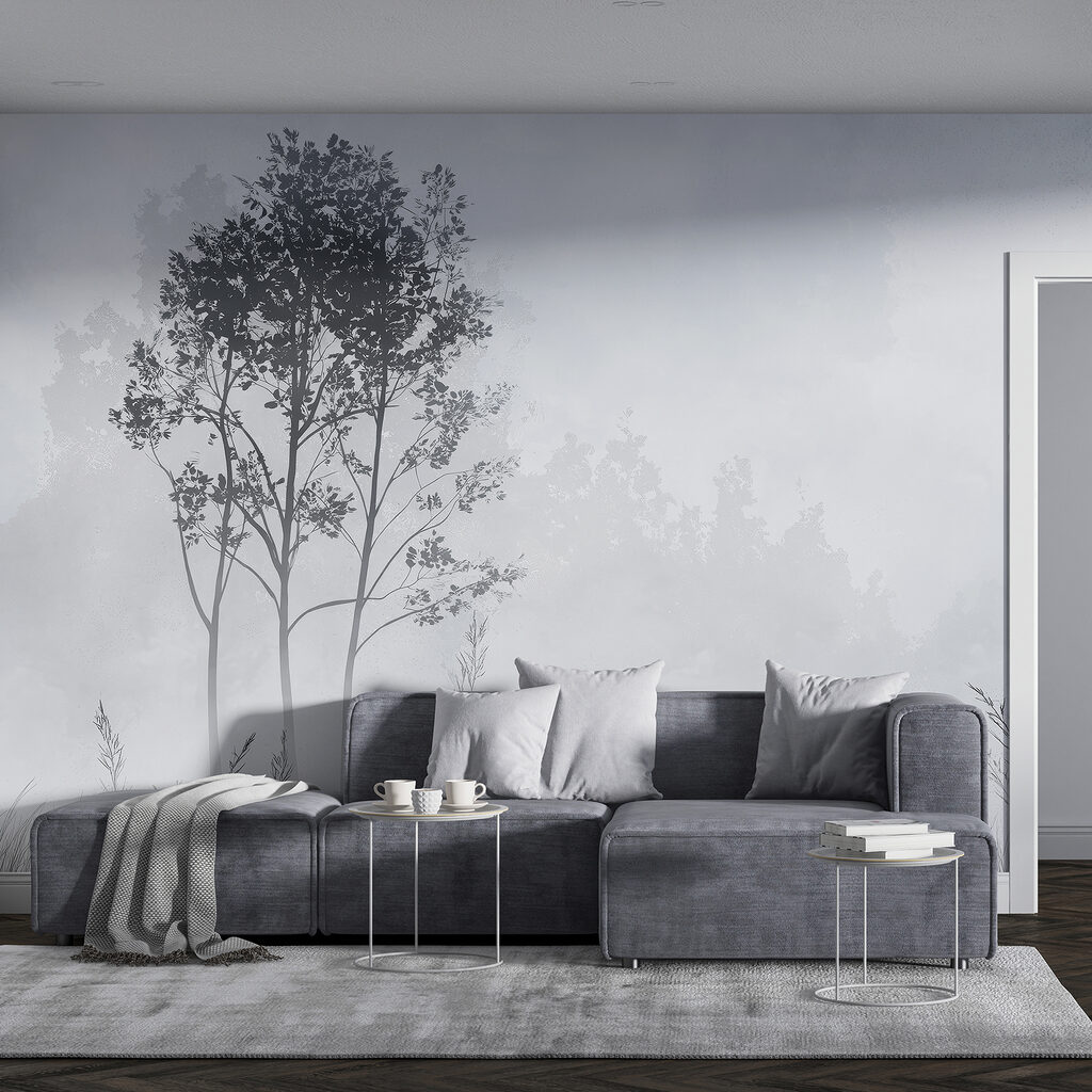 Deux arbres sur l’herbe dans un intérieur