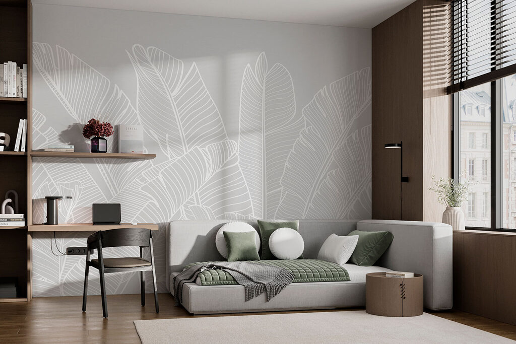 Feuilles tropicales déployées dans un intérieur